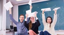 students-celebrating-exam-results